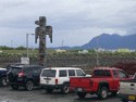 A totem pole in the parking lot